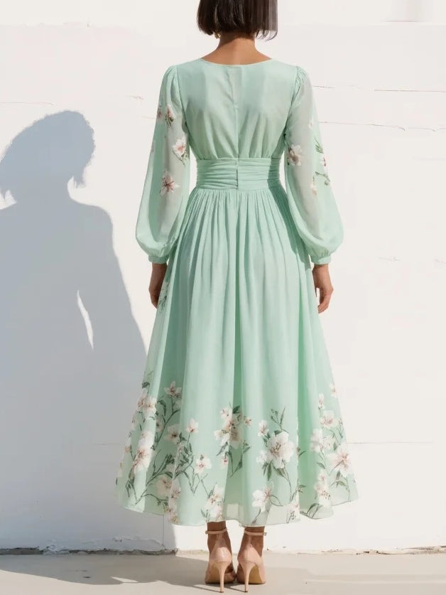 Odelia – Robe midi florale à la silhouette fluide